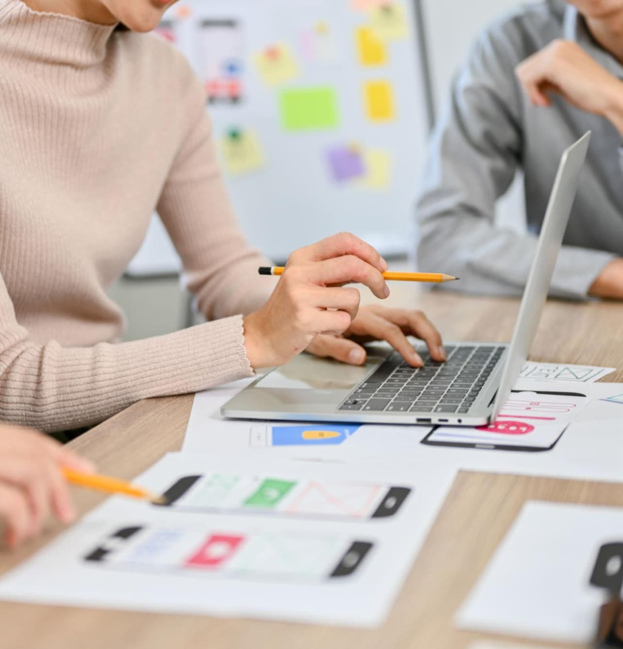 Business team collaborating on white-label loyalty platform branding