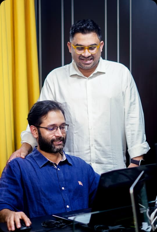 Professional with laptop in workspace